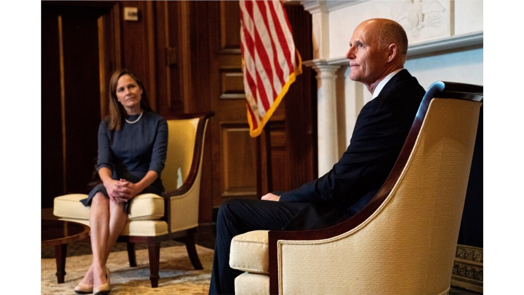 Sen. Rick Scott, R-Fla., right, meets with Judge Amy Coney Barrett, President Donald Trumps nominee for the U.S. Supreme Court, on Capitol Hill in Washington, Sept. 29, 2020.