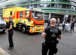An ambulance which is believed to transport Alexei Navalny arrives at the Charite hospital in Berlin, Germany, Aug.22, 2020.