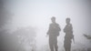 Para kombatan yang menentang militer Myanmar tampak di Kaw Thoo Lei, negara bagian Kayin, Myanmar, 31 Januari 2019. Tentara Myanmar, mengatakan pada Sabtu, 15 Mei 2021, bahwa pihaknya memerangi milisi di Kota Mindat.