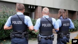 FILE - German police officers. 