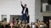 Socialist Hardliners Aim Guns on Guaido March in Venezuela