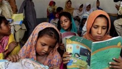 Pakistani girls in Peshawar last year. Their classes were held privately after Islamic militants reportedly blew up their school in an effort to prevent girls from getting an education.