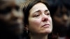 Francine Wheeler, mother of Sandy Hook Elementary School shooting victim Benjamin Wheeler, cries as she listens to Vice President Joe Biden speak during a gun violence conference in Danbury, Conn., Feb. 21, 2013.