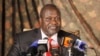 FILE - South Sudan rebel leader Riek Machar addresses journalists during a news conference in Nairobi, Kenya, July 8, 2015. 