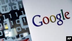 FILE - The Google logo displayed at the company's European headquarters in Brussels, Belgium, March 23, 2010.