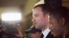 South African Olympic and Paralympic track star Oscar Pistorius arrives at the North Gauteng High Court in Pretoria, Sept. 12, 2014.
