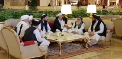 Members of the Taliban delegation are seen at the Sheraton Doha, before the start of the intra-Afghan dialogue, in Doha, Qatar, July 7, 2019. (A. Tanzeem/VOA)