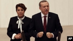 Turkey's President Recep Tayyip Erdogan addresses the parliament in Ankara, Turkey, Oct. 1, 2016. 