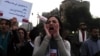 A woman shouts slogans against Egyptian President Mohamed Morsi and members of the Brotherhood during a march against sexual harassment and violence against women in Cairo, Feb. 6, 2013. 