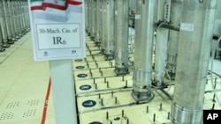 FILE - This photo released Nov. 5, 2019, by the Atomic Energy Organization of Iran, shows centrifuge machines in the Natanz uranium enrichment facility in central Iran.