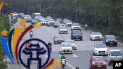 ទិដ្ឋភាពចរាចរនៅទីក្រុងហាណូយប្រទេសវៀតណាមកាលពីថ្ងៃទី២៩ មីនា ឆ្នាំ២០២៣។