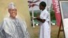 An art student takes part in a competition by drawing a portrait of President-elect Muhammad Buhari, during an art exhibition by Malami Leadership Foundation showcasing portraits of Nigeria's former presidents and heads of state in Abuja, May 27, 2015.