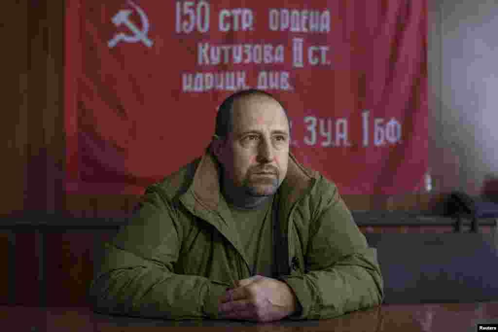 Rebel commander Alexander Khodakovsky of the pro-Russian Vostok Battalion says hundreds of Russian volunteers are supporting separatists in eastern Ukraine, offering them vital experience in battle tactics and training to attack Ukrainian forces, in Donetsk, Sept. 17, 2014.