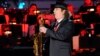 Saxophonist Boney James performs at the 5th Annual Holiday Tree Lighting at L.A. Live in Los Angeles, California, Nov. 28, 2012. 