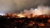 The remains of a fertilizer plant burn after an explosion at the plant in the town of West, near Waco, Texas early Apr. 18, 2013.