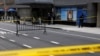 'Net is tightening' on man suspected of shooting executive, says official