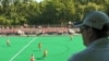 Coach Lee Bodimeade watches the U.S. woman's field hockey team in practice.