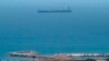 A picture taken from La Linea de la Concepcion in southern Spain shows supertanker Grace 1 suspected of carrying crude oil to Syria in violation of EU sanctions after it was detained in Gibraltar on July 4, 2019.