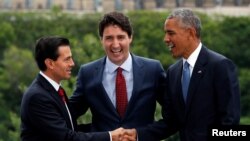  Enrique Pena Nieto, Justin Trudeau et Barack Obama, Ottawa, Ontario, Canada, le 29 juin 2016. (REUTERS/Chris Wattie) 