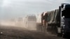 Trucks travel to deliver aid to Gaza, in Rafah, Egypt. (Hamada Elrasam/VOA) 