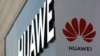 Archivo. La marca Huawei se observa en las afueras de una tienda en Beijing.