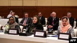 FIEL - Afghan women delegates attend Intra-Afghan Dialogue talks in Doha, Qatar, July 7, 2019.