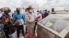 Kenya's President Uhuru Kenyatta unveils the first berth of Chinese-funded Lamu Port in Lamu, Kenya, May 20, 2021. 