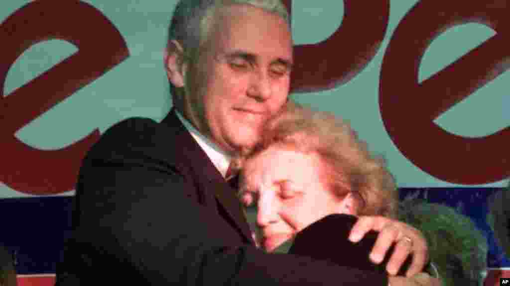 Republican candidate Mike Pence, left, hugs his mother Nancy Pence following his victory speech in Anderson, Indiana, Nov. 7, 2000. Pence defeated Democrat Bob Rock for the seat in Indiana's 2nd Congressional District.