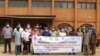 Photo de famille des participants d’un séminaire sur l’espace civique à Lomé, 31 mars 2021. (VOA/Kayi Lawson)