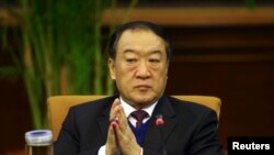 Su Rong, mantan pemimpin partai komunis China di propinsi Jiangxi dan wakil ketua Kongres Musyawarah Rakyat China, saat menghadiri Kongres Nasional di Beijing, 6 Maret 2012 (Foto: dok).