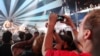 Mark Vopel records Jane's Addiction performance on the LG Thrill 4G, a glasses free 3D smartphone, at the 3D User-Generated Concert, July 25, 2011 in New York.