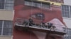 Los Angeles artist Robert Vargas says he's fulfilling his destiny by painting a huge mural in his hometown. (A. Martinez/VOA)