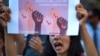 Para aktivis hak-hak perempuan dalam unjuk rasa di Barcelona, Spanyol, 21 Juni 2018. 