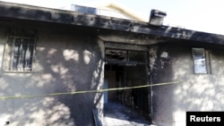 A view of damage at the burned Islamic Society of Coachella Valley, Dec. 12, 2015. 