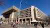 FBI Agent at Center of Clinton Email Probe Controversy Escorted From Building 