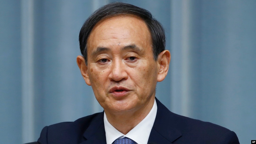 FILE - Japan's Chief Cabinet Secretary Yoshihide Suga.