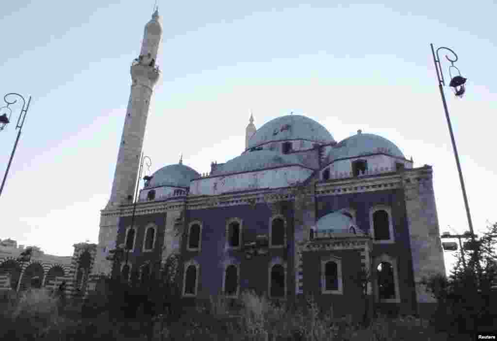 A view of the damaged Khalid ibn al Walid Mosque in Homs, Syria, May 14, 2013.