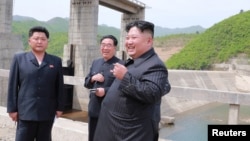 North Korean leader Kim Jong Un visits Kumyagang Power Station No. 2 in North Korea in this May 4, 2019, photo supplied by the Korean Central News Agency.
