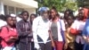 Fencing champion Ibtihaj Muhammad tells students at the John F. Kennedy all-girls school in Dakar that they can do anything they believe in, Feb. 7, 2014. (Jennifer Lazuta/VOA) 