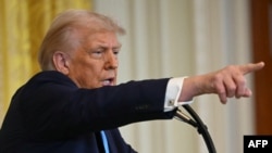 Američki predsjednik Donald Tramp na konferenciji za novinare sa izraelskim premijerom Benjaminom Netanjahuom u Bijeloj kući (Foto: ANDREW CABALLERO-REYNOLDS / AFP)