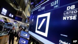 Suasana di Bursa Saham New York (26/9). (AP/Richard Drew)