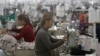 Employees work at a factory supplier of the H&M brand in Kandal province, Cambodia, December 12, 2018.