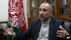 FILE - Afghan National Security Adviser Hanif Atmar speaks during an interview in Kabul, Afghanistan, Oct. 24, 2015. Atmar claims Islamic State fighters detained in Afghanistan had documents showing Pakistani citizenship.