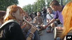 Russian protesters, evicted from a camp at Chistiye Prudy, at their newly chosen downtown site, Moscow, May 16, 2012.