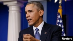 President Barack Obama answers questions during a press conference in the briefing room of the White House, Dec. 19, 2014. 