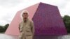 Artist Christo’s Floating Barrels on a Lake