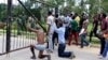 University of Zambia students "surrender" to police in Lusaka after the Zambian government announced the university's closure, Feb. 3, 2016.