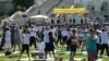 Yoga Practitioners Bring Mats to the Lawn of US Capitol