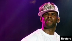 FILE - U.S. vocalist, songwriter and producer R. Kelly performs at the St Lucia Jazz and Arts Festival at Pigeon Island National Landmark, May 12, 2013.