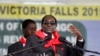 Zimbabwe President Robert Mugabe addresses people gathered for his 91st birthday celebration in Victoria Falls, Feb. 28, 2015. 